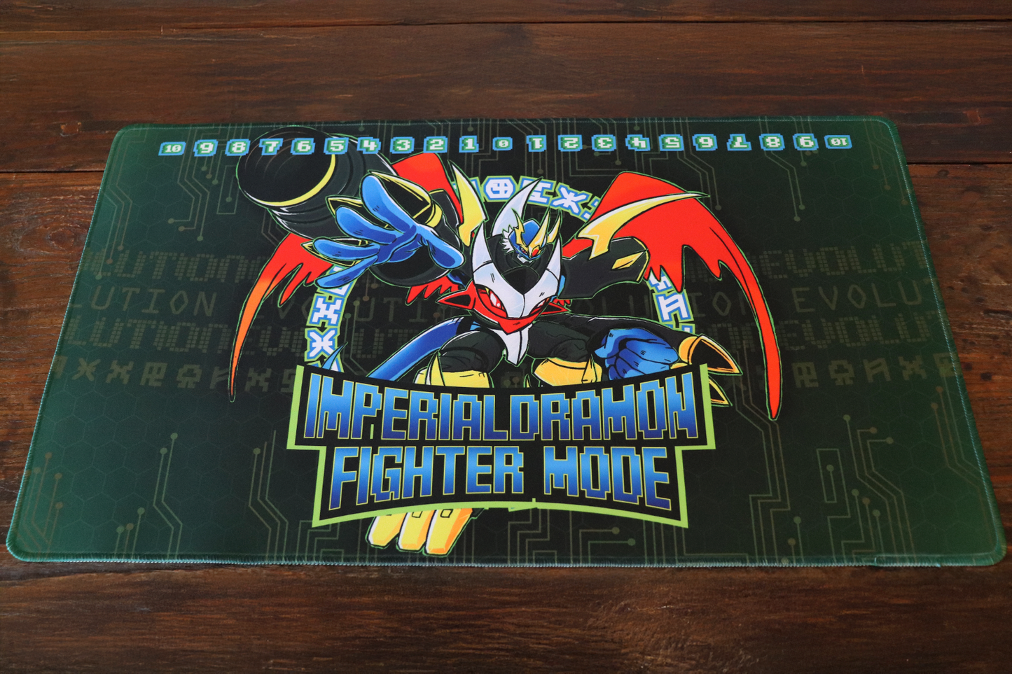 Digimon Card Game playmat artwork featuring Imperialdramon Fighter Mode in an action pose with cannon arm and red wings, set on a dark green cyber circuit background with a memory gauge counter across the top.