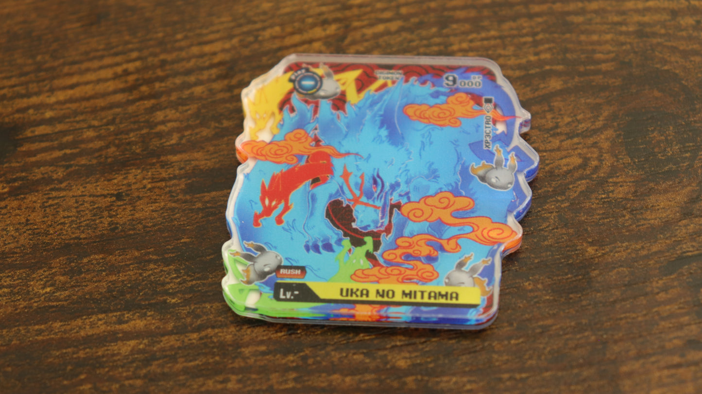 Uka no Mitama acrylic token for the Digimon Card Game, shown in a close-up product photo with blue spirit fox artwork, orange cloud accents, and a clear acrylic finish for the Sakuyamon theme.